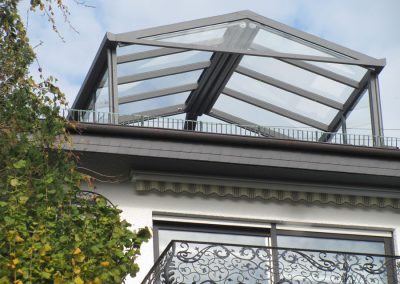 Terrassenüberdachung als Satteldach mit Glas und Unterglasbeschattungen Loch Limburgerhof